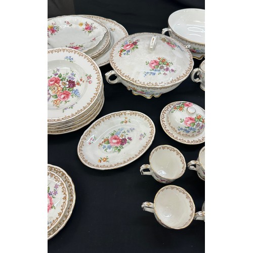 74 - Crown Staffordshire dinner and coffee set, damage to sugar bowl lid, all other pieces in good overal... 