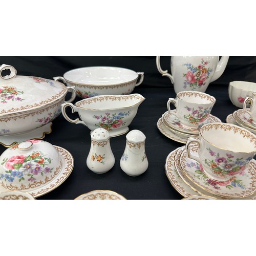 74 - Crown Staffordshire dinner and coffee set, damage to sugar bowl lid, all other pieces in good overal... 