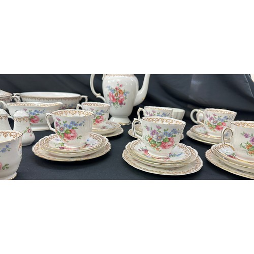 74 - Crown Staffordshire dinner and coffee set, damage to sugar bowl lid, all other pieces in good overal... 