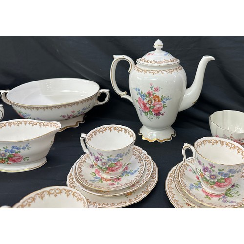 74 - Crown Staffordshire dinner and coffee set, damage to sugar bowl lid, all other pieces in good overal... 