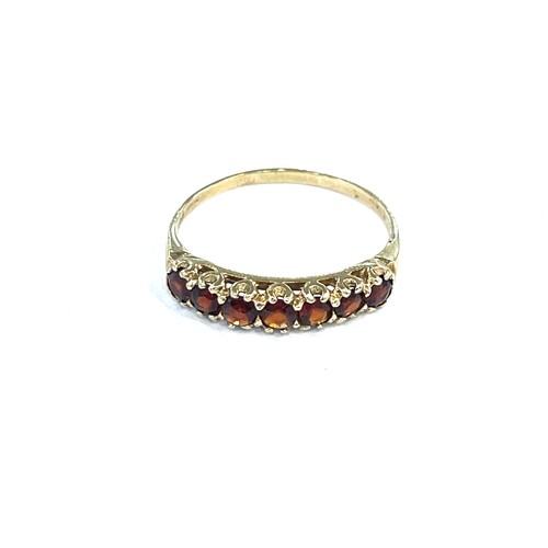 94 - Ladies half eternity garnet ring, ring size R/S, approximate weight 1.8g