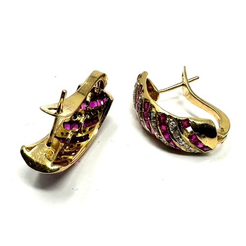 115 - 18ct gold ruby & diamond earrings weight 7.7g