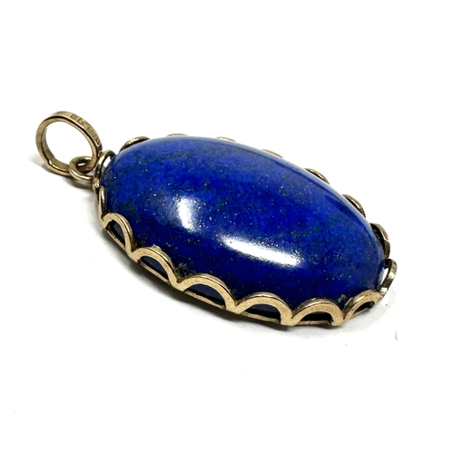 122 - 9ct gold & Lapis pendant measurtes approx 3.2cm by 1.9cm weight 6g