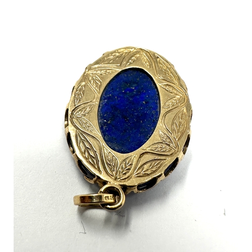 122 - 9ct gold & Lapis pendant measurtes approx 3.2cm by 1.9cm weight 6g