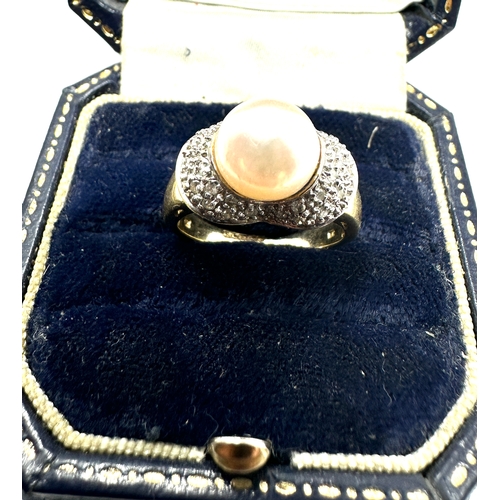 124 - 9ct gold pearl & diamond ring weight 4.7g