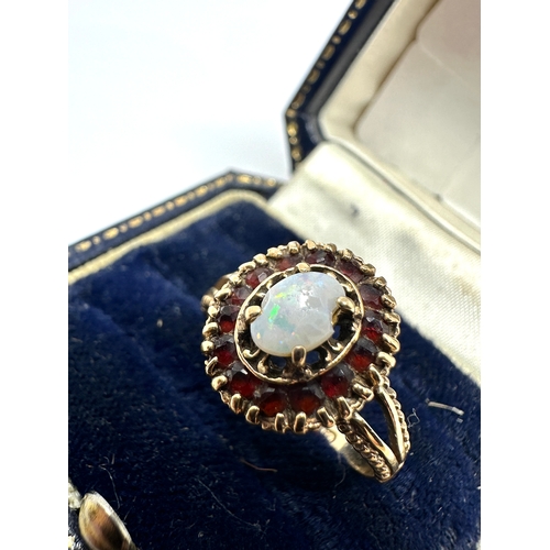 128 - 9ct gold opal & garnet ring weight 3.1g opal as seen