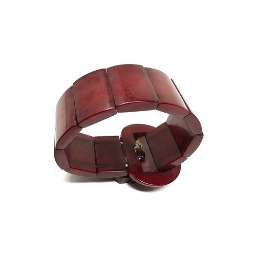 133 - Vintage Cherry Amber /bakelite buckle bracelet internal streaking through out  weight 28g