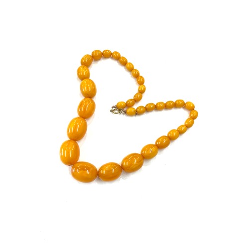 494 - Bakelite / Amber ladies vintage egg yolk necklace, approximate overall weight 84.9g