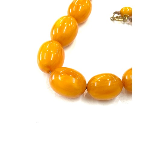 494 - Bakelite / Amber ladies vintage egg yolk necklace, approximate overall weight 84.9g