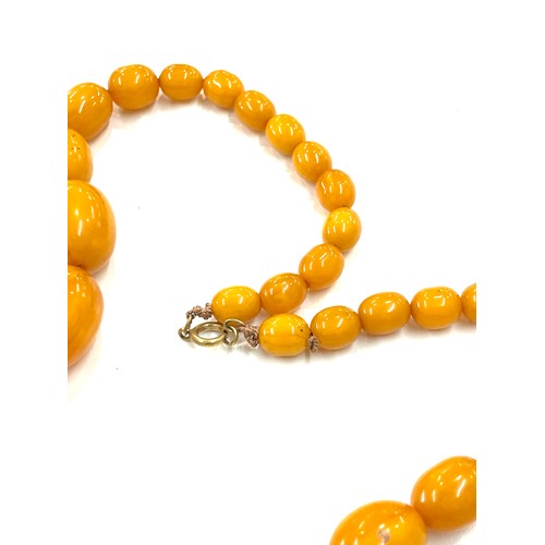 494 - Bakelite / Amber ladies vintage egg yolk necklace, approximate overall weight 84.9g