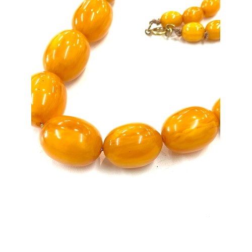 494 - Bakelite / Amber ladies vintage egg yolk necklace, approximate overall weight 84.9g