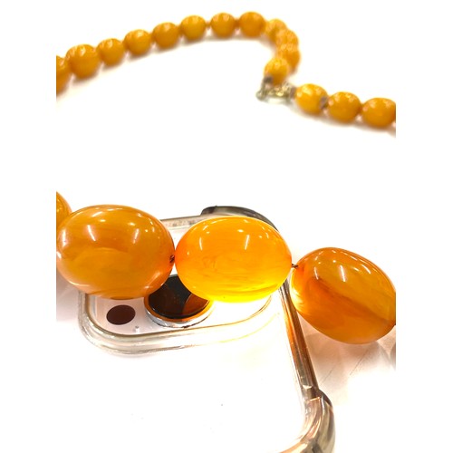 494 - Bakelite / Amber ladies vintage egg yolk necklace, approximate overall weight 84.9g