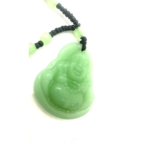 495 - Jade Bhuddha pendant necklace