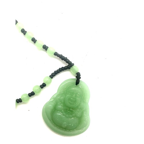 495 - Jade Bhuddha pendant necklace