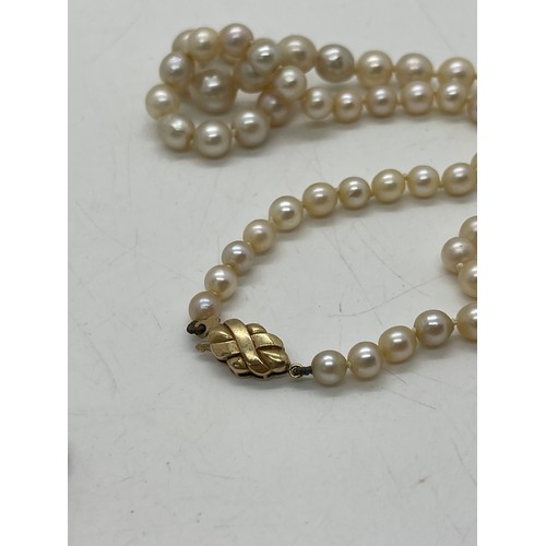 502 - Two pearl necklaces with gold clasps. one 9ct, the other 14k.