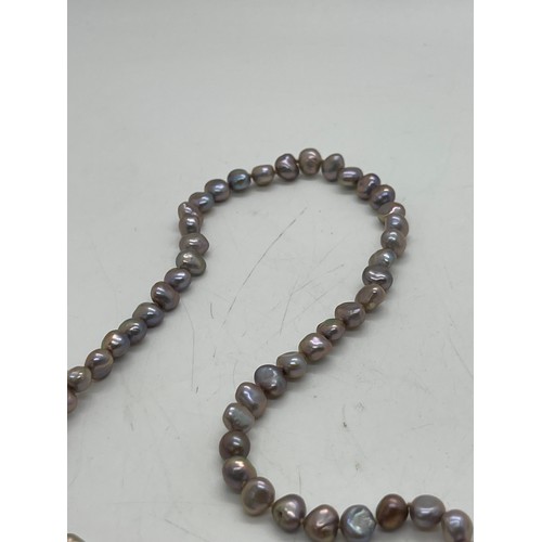 502 - Two pearl necklaces with gold clasps. one 9ct, the other 14k.