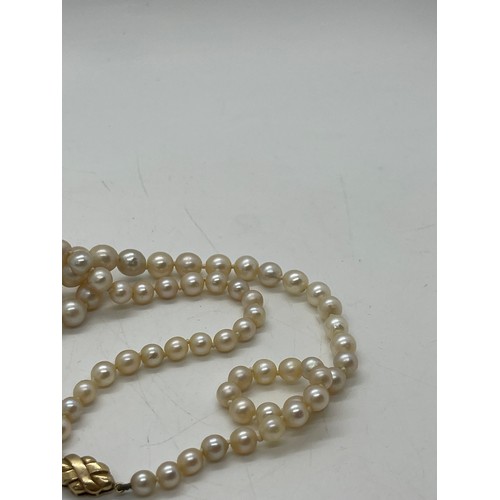 502 - Two pearl necklaces with gold clasps. one 9ct, the other 14k.