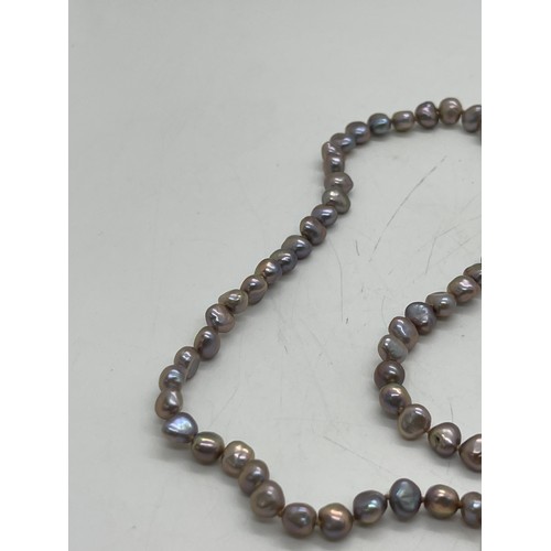 502 - Two pearl necklaces with gold clasps. one 9ct, the other 14k.