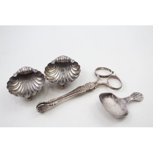 68 - 4 x .925 sterling silver salts, caddy spoon & sugar nips