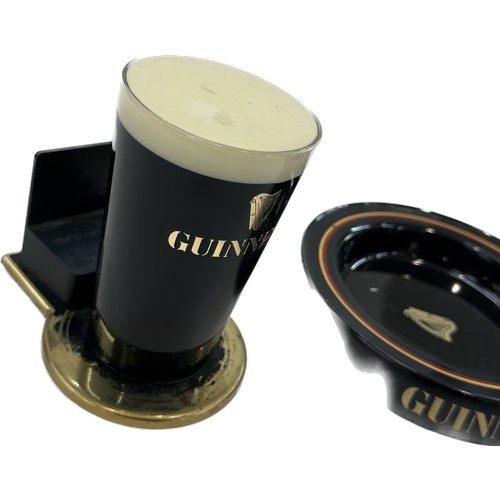 71 - Vintage Guinness illuminating bar front light, untested 6 inches tall and a advertising ashtray