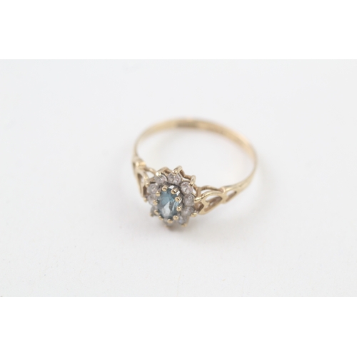 177 - 9ct gold blue topaz and cubic zirconia cluter ring (1.3g)