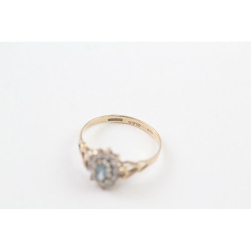 177 - 9ct gold blue topaz and cubic zirconia cluter ring (1.3g)