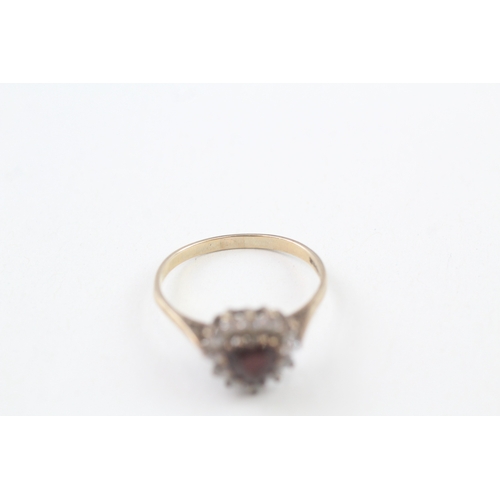 182 - 9ct gold heart cut garnet and cubic zirconia set cluster ring (2.3g)