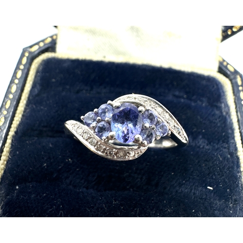 141 - 9ct white gold tanzanite & diamond ring weight 2.5g