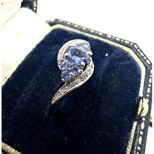 141 - 9ct white gold tanzanite & diamond ring weight 2.5g