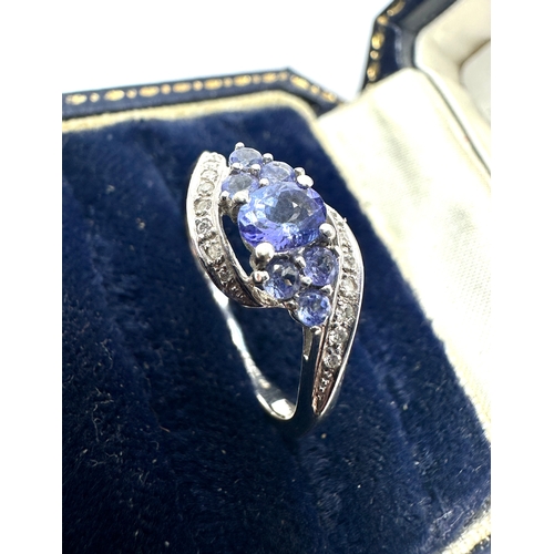 141 - 9ct white gold tanzanite & diamond ring weight 2.5g