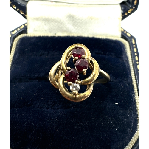 142 - 9ct gold diamond & ruby ring weight 2.7g