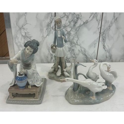 75 - Three pieces of Lladro figures to include ducks etc