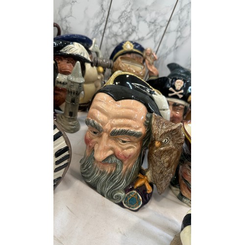 125 - 18 large Royal Doulton character jugs to include Dick Turpin, Robin Hood, 1st Versions also Merlin- ... 