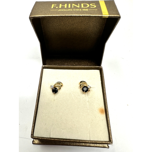 162 - Boxed 9ct gold sapphire & white gemstone earrings