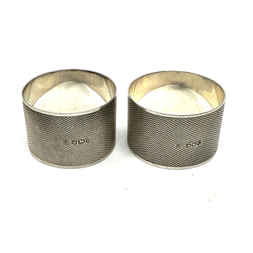 20 - Pair of antique engine turned silver napkin rings weight 58g