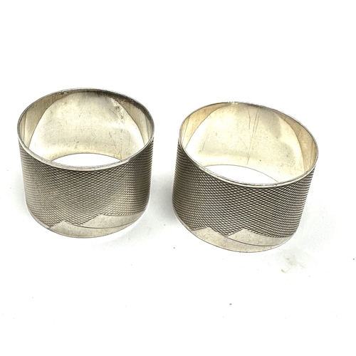 20 - Pair of antique engine turned silver napkin rings weight 58g