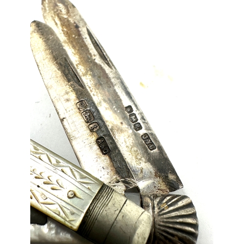 21 - 2 antique silver fruit knives in good condition