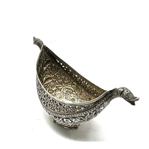 27 - A rare mid to late nineteenth century traditional silver  Kashkul or begging bowl  , boat shape with... 