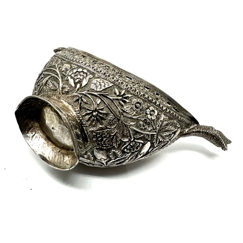 27 - A rare mid to late nineteenth century traditional silver  Kashkul or begging bowl  , boat shape with... 