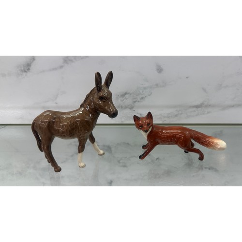 2 - Beswick donkey figure and a Beswick fox (fox a/f)