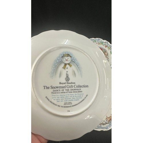 583 - Four Royal Doulton ' The Snowman' plates to include ' Dance of the Snowman', ' Snowman Christmas cak... 