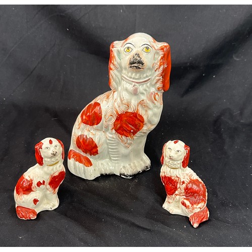 25A - Three vintage Staffordshire dog figures largest measures 8 inches tall