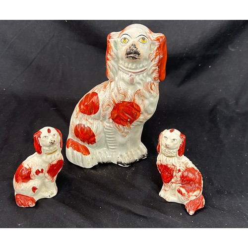 25A - Three vintage Staffordshire dog figures largest measures 8 inches tall