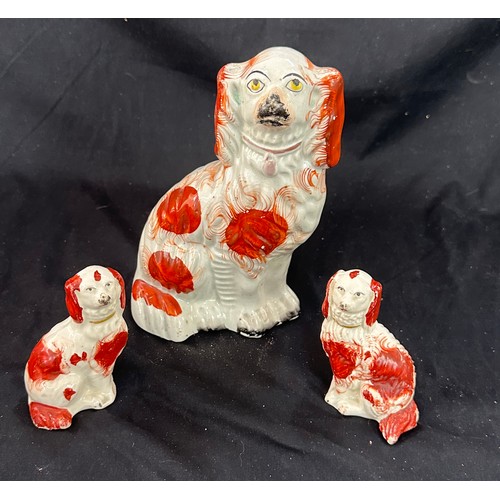 25A - Three vintage Staffordshire dog figures largest measures 8 inches tall