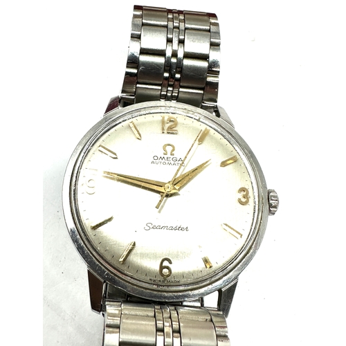 424 - Vintage Boxed Gents s/steel Omega automatic seamaster wristwatch the watch is clean and is ticking