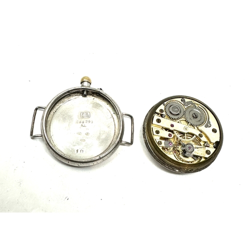 431 - ww1 silver cased trench watch the balance spins but not ticking case measures approx 33mm