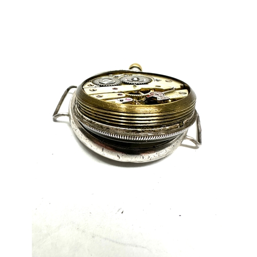 431 - ww1 silver cased trench watch the balance spins but not ticking case measures approx 33mm