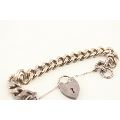 429 - A vintage silver heart padlock bracelet (57g)