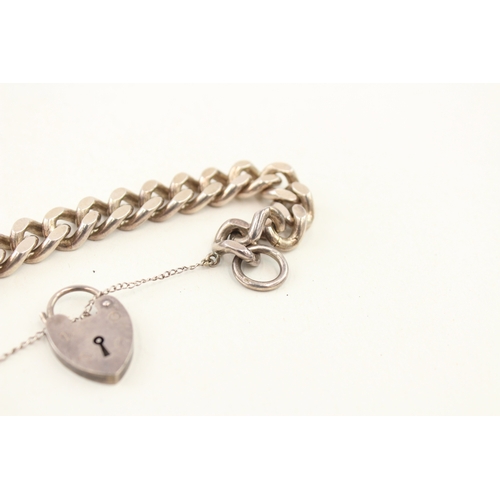 429 - A vintage silver heart padlock bracelet (57g)