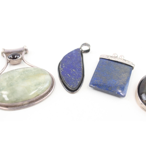 430 - Five silver stone set pendants including lapis (101g)